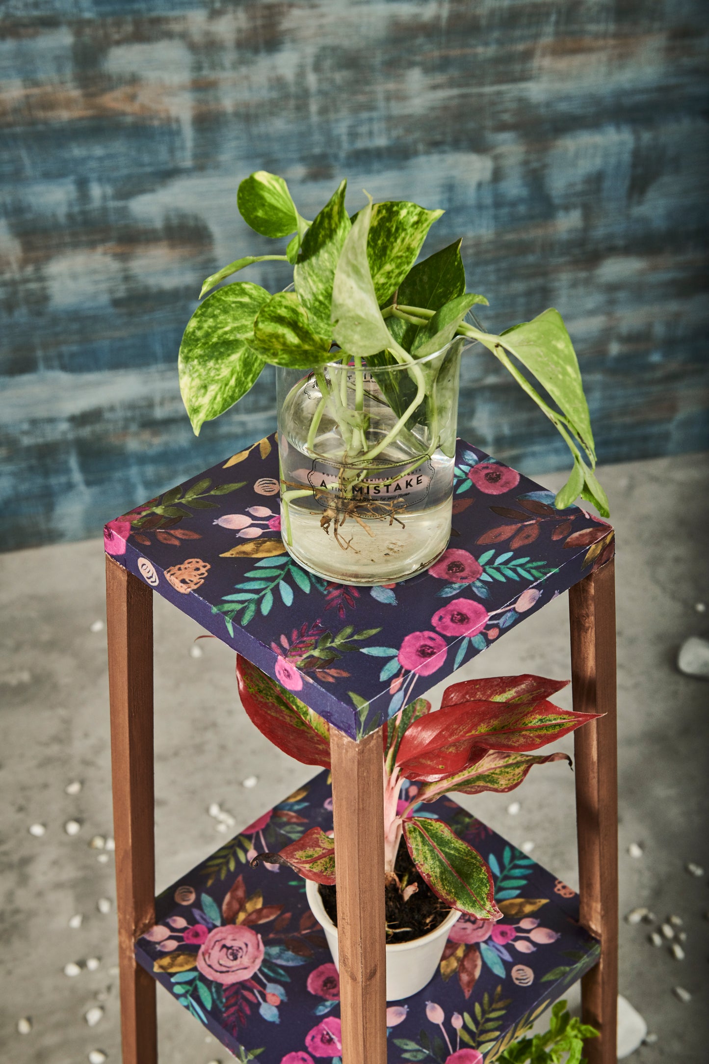 A Tiny Mistake Square Four Legged Tapering Three Tier Decorative Stand (Three Tiers) (Floral Base with Dark Legs)