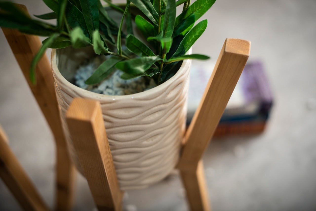Three Wooden Planter Stands with Ceramic Pots