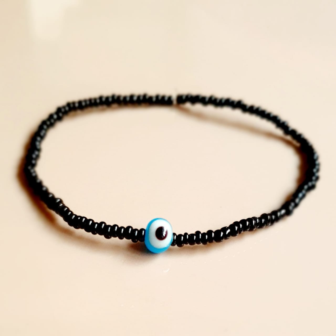 ATM Evil Eye Bracelet, Light Blue Evil Eye with Black Beads for Good Luck and Prosperity, Nazariya, Nazar Battu, Evil Eye Charm Bracelet , Flexi Cord (1 Piece)