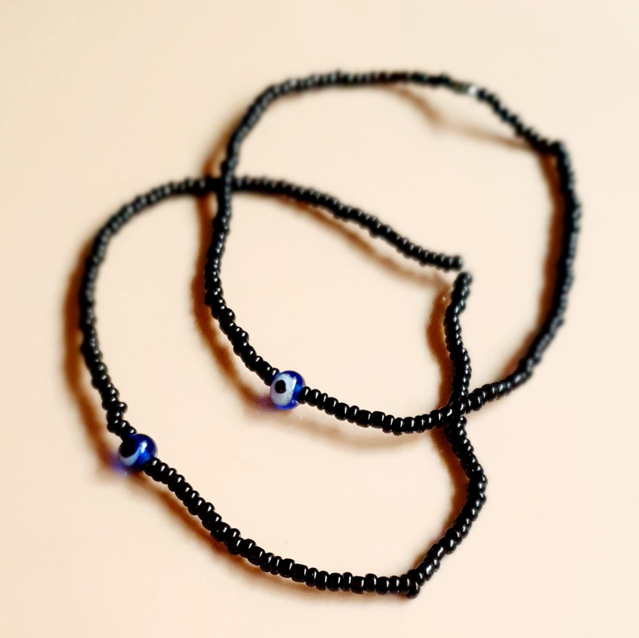 ATM Evil Eye Bracelet for Couples, Small Blue Evil Eye with Black Beads for Good Luck and Prosperity, Nazariya, Nazar Battu, Evil Eye Charm Bracelet , Flexi Cord (2 Pieces)