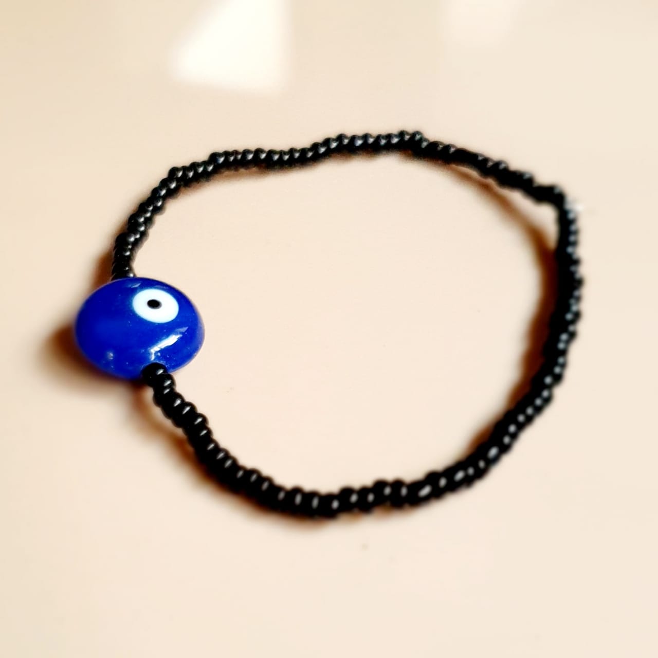 ATM Evil Eye Bracelet, Flat Blue Evil Eye with Black Beads for Good Luck and Prosperity, Nazariya, Nazar Battu, Evil Eye Charm Bracelet , Flexi Cord (1 Piece)