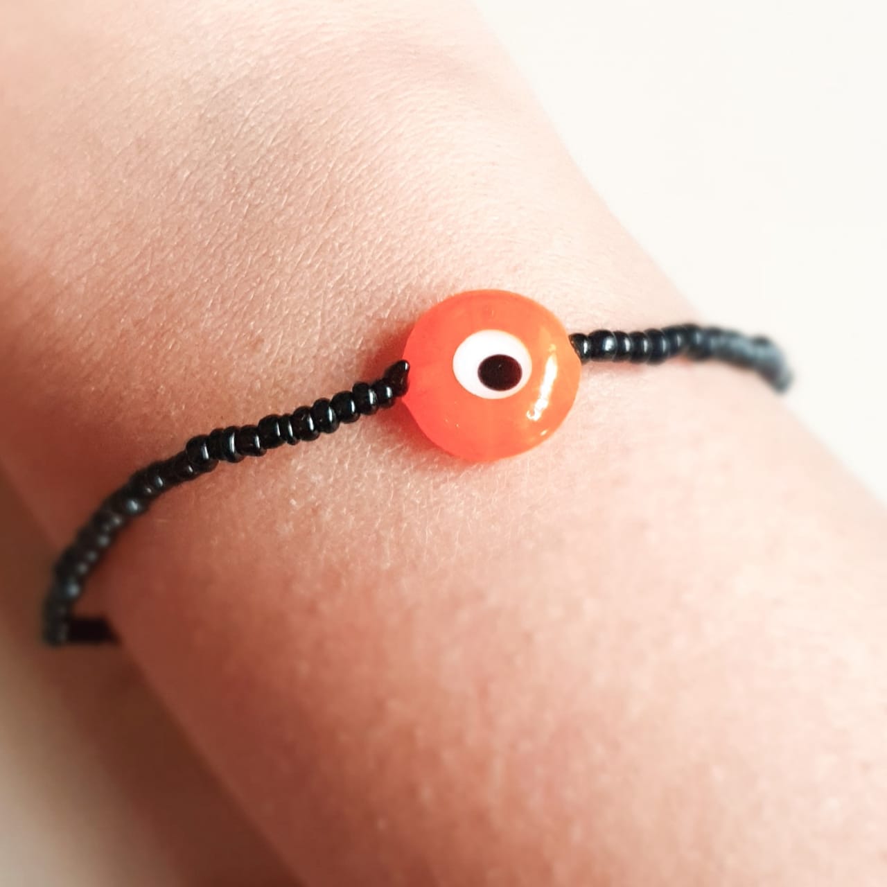 ATM Evil Eye Bracelet, Flat Orange Evil Eye with Black Beads for Good Luck and Prosperity, Nazariya, Nazar Battu , Flexi Cord (1 Piece) (Orange Evil Eye - Happiness, Protection and Creativity)