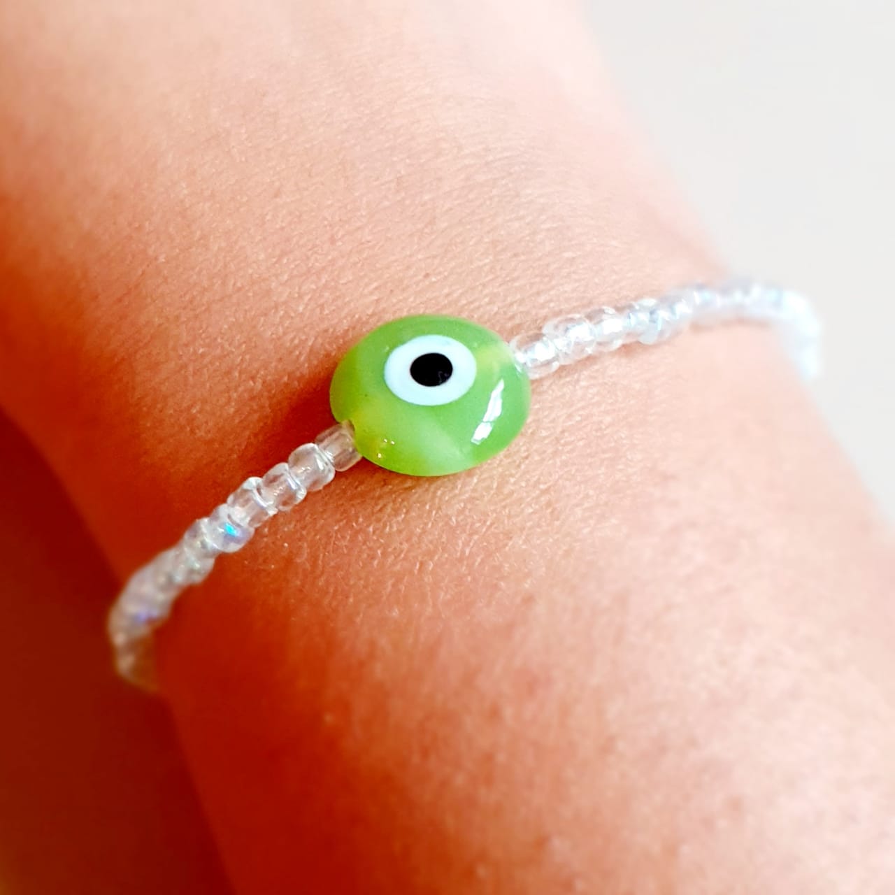 ATM Evil Eye Bracelet, Flat Light Green Evil Eye with Transparent Beads for Good Luck and Prosperity, Nazariya, Nazar Battu , Flexi Cord (1 Piece) (Light Green Evil Eye - Success and Good Health)