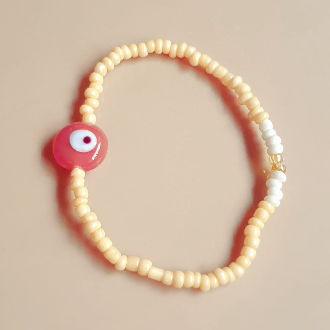 ATM Evil Eye Bracelet, Flat Light Brown Evil Eye with Cream Beads for Good Luck and Prosperity, Nazariya, Nazar Battu , Flexi Cord (1 Piece) (Light Brown Evil Eye - Order and Organisation)