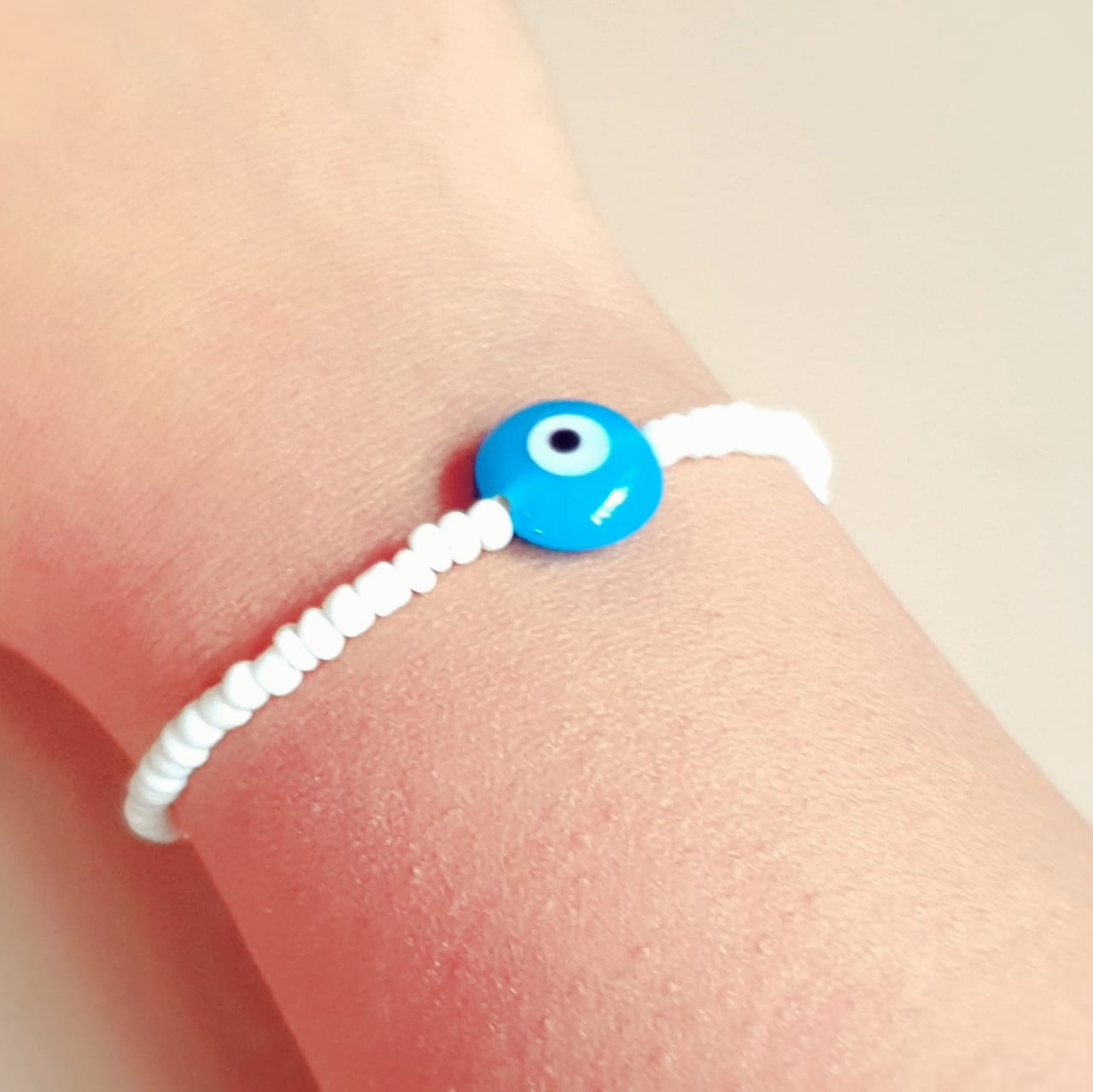 ATM Evil Eye Bracelet, Flat Light Blue Evil Eye with White Beads for Good Luck and Prosperity, Nazariya, Nazar Battu , Flexi Cord (1 Piece) (Light Blue Evil Eye - Solitude, Protection and Peace)
