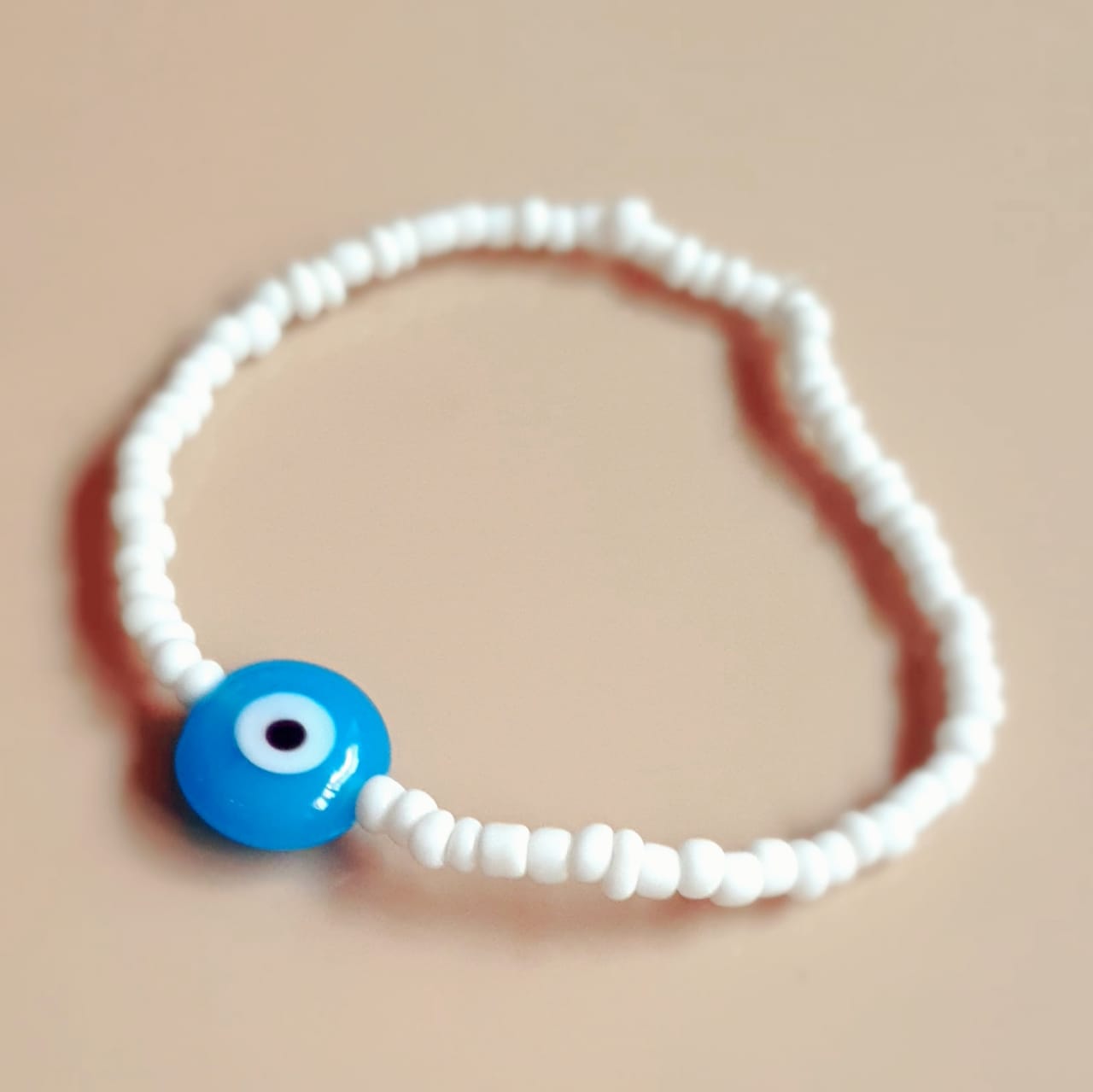 ATM Evil Eye Bracelet, Flat Light Blue Evil Eye with White Beads for Good Luck and Prosperity, Nazariya, Nazar Battu , Flexi Cord (1 Piece) (Light Blue Evil Eye - Solitude, Protection and Peace)