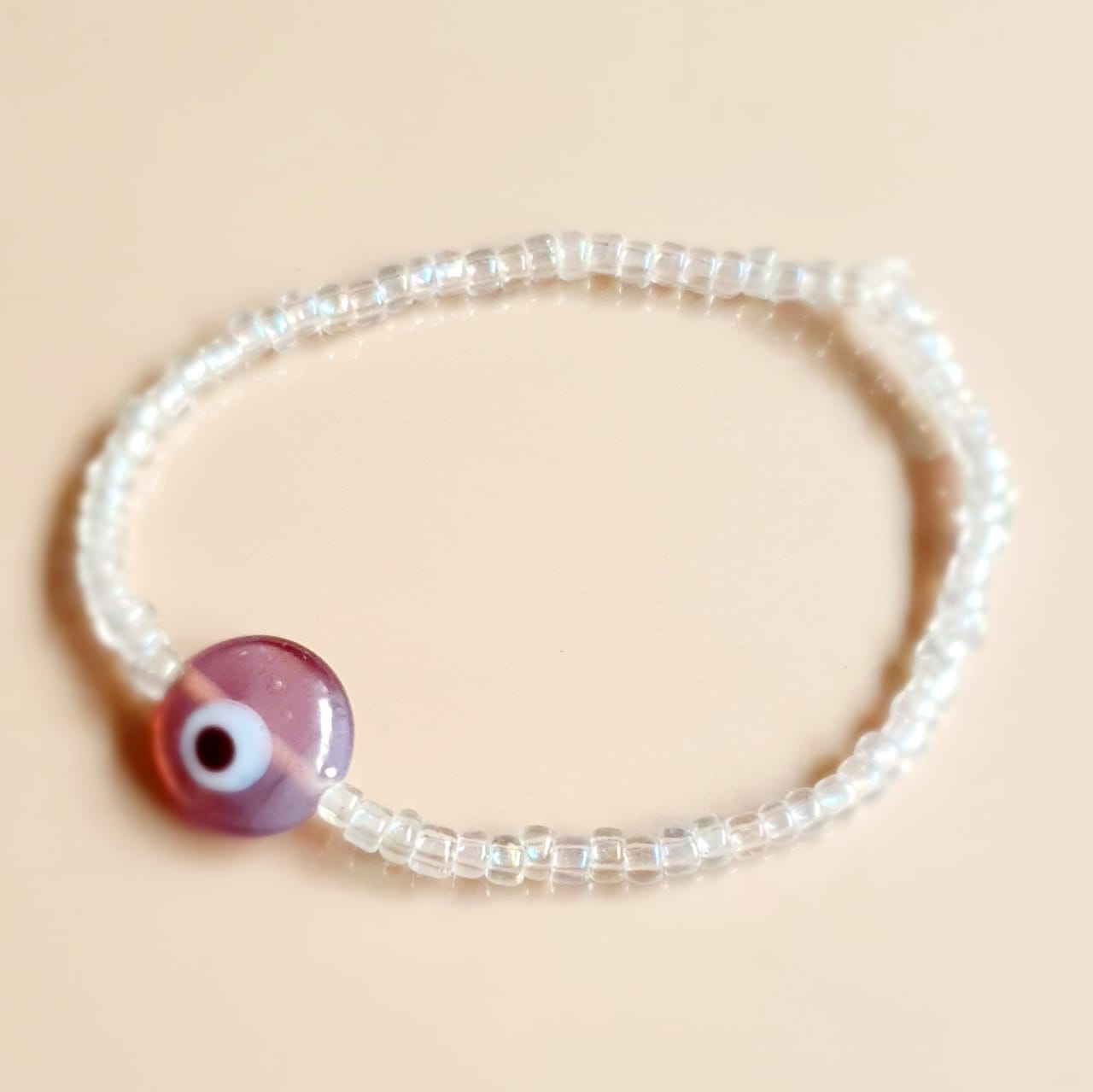ATM Evil Eye Bracelet, Flat Light Purple Evil Eye with Transparent Beads for Good Luck, Nazariya, Nazar Battu , Flexi Cord (1 Piece) (Light Purple Evil Eye - Imagination and Balance in Life)