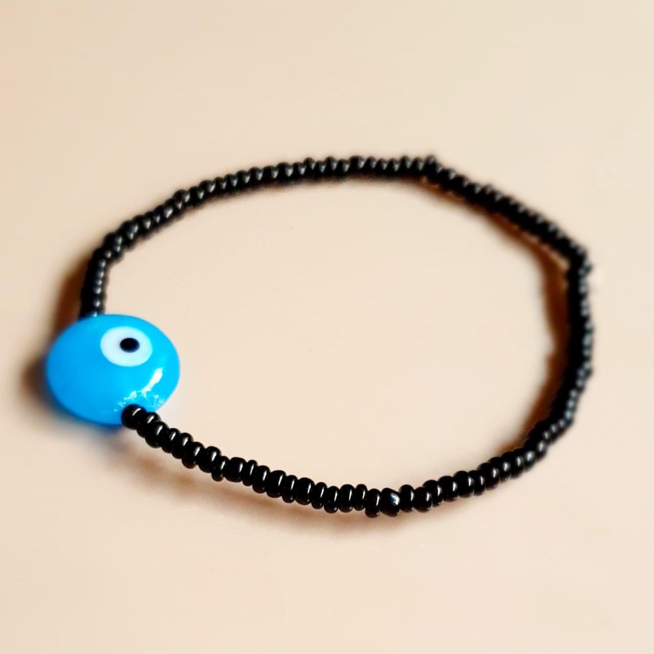 ATM Evil Eye Bracelet, Flat Light Blue Evil Eye with Black Beads for Good Luck and Prosperity, Nazariya, Nazar Battu , Flexi Cord (1 Piece) (Light Blue Evil Eye - Solitude, Protection and Peace)